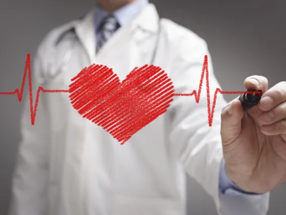 Doctor drawing a heart